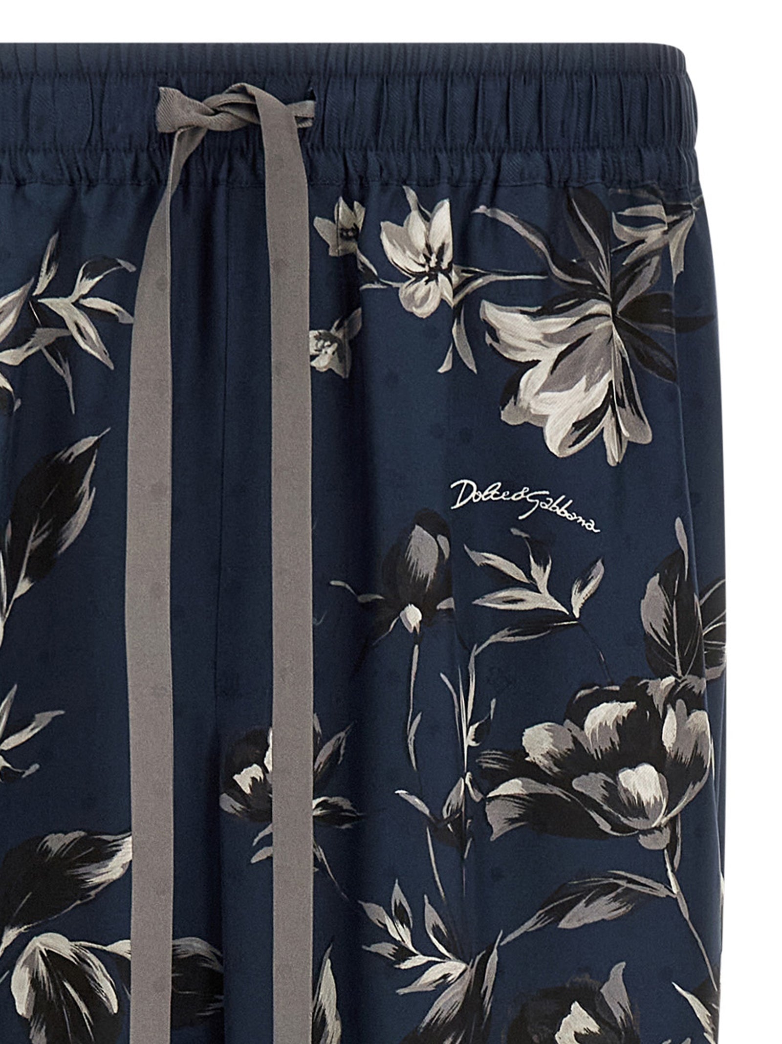 Trousers by Dolce & Gabbana for men in silk twill blue & print features a artisanal silhouette, showcasing a sophisticated straight-leg & wide with a long and for a artisanal finish.