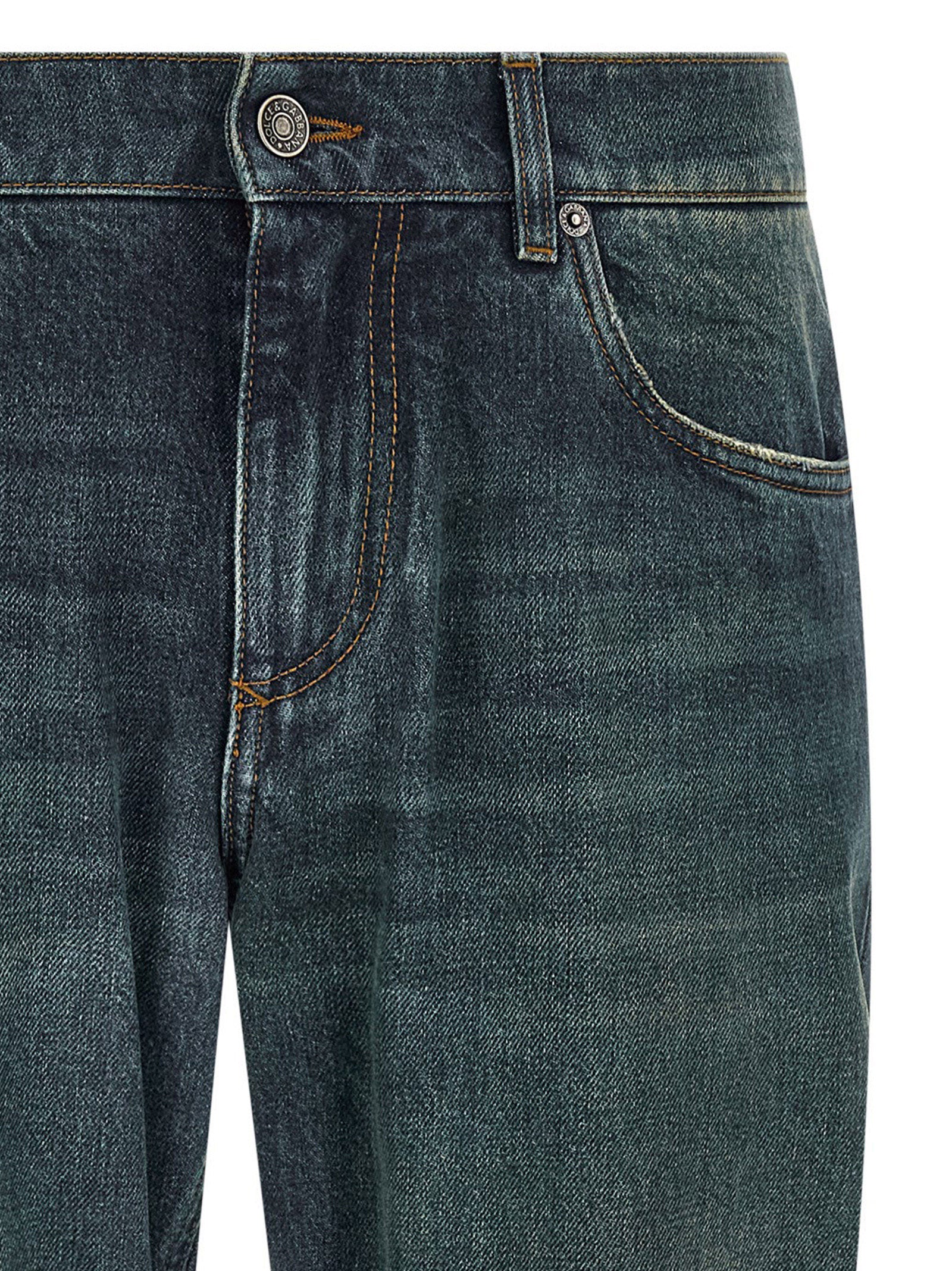 Jeans by Dolce & Gabbana for men in cotton denim blue features a polished silhouette with a polished straight-leg, reaching a polished long and finished with a polished low rise.
