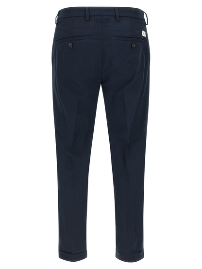 Chinos Pants by Department 5 for men in cotton blue presents a sartorial luxe silhouette, showcasing a sophisticated straight-leg & regular-fit with a long and for a premium, sartorial luxe finish.