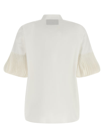 Blouse by Valentino Garavani for women in cotton white & patterned presents a discerning silhouette, showcasing a sophisticated mandarin neckline and for a truly discerning finish.