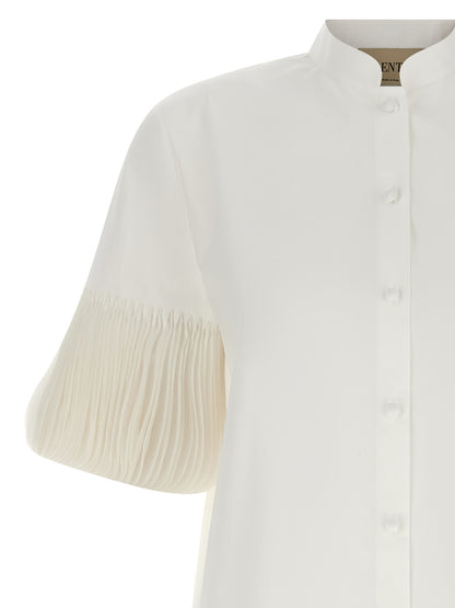 Blouse by Valentino Garavani for women in cotton white & patterned features an architectural silhouette with a refined and elegant mandarin neckline for a architectural look.