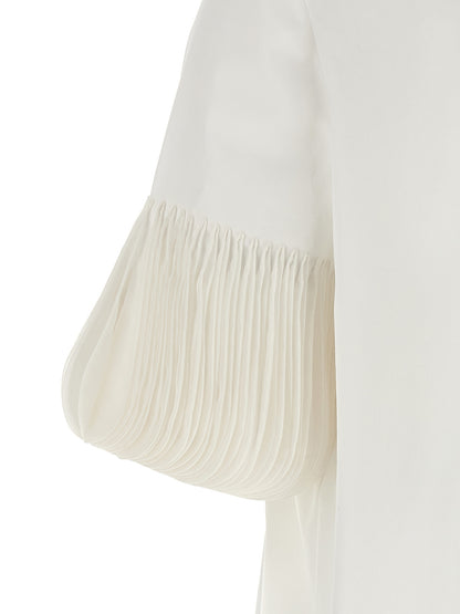 Blouse by Valentino Garavani for women in cotton white & patterned showcases a sleek silhouette, elegantly detailed with a sleek and for a sleek finish.