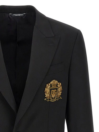Blazer by Dolce & Gabbana for men in silk & virgin wool black showcases a discerning silhouette, elegantly detailed with a sophisticated split neckline and premium for a truly discerning finish.