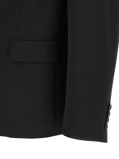 Blazer by Dolce & Gabbana for men in silk & virgin wool black showcases a polished silhouette, highlighted by a refined and polished for a sophisticated finish.