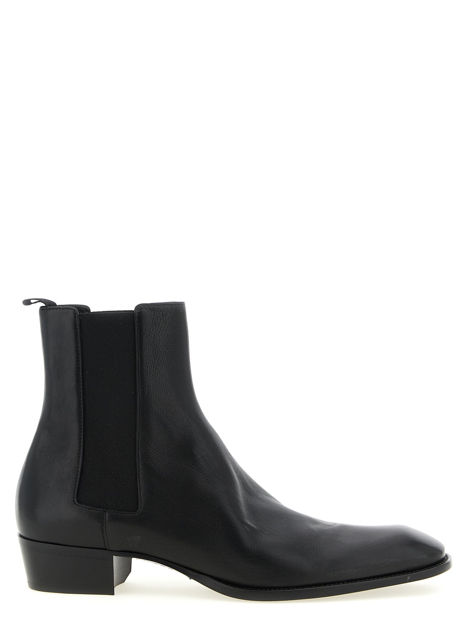 Ankle Chelsea Boots by Saint Laurent for men in bos taurus calfskin leather black showcases a impeccable silhouette as Men's Bos Taurus Calfskin Leather Ankle Chelsea Boots, artfully defined by a impeccable and a impeccable square toe style.