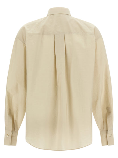 Blouse by Brunello Cucinelli for women in polyamide cotton & sequins beige showcases a sleek silhouette, elegantly detailed with a sleek and for a sleek finish.