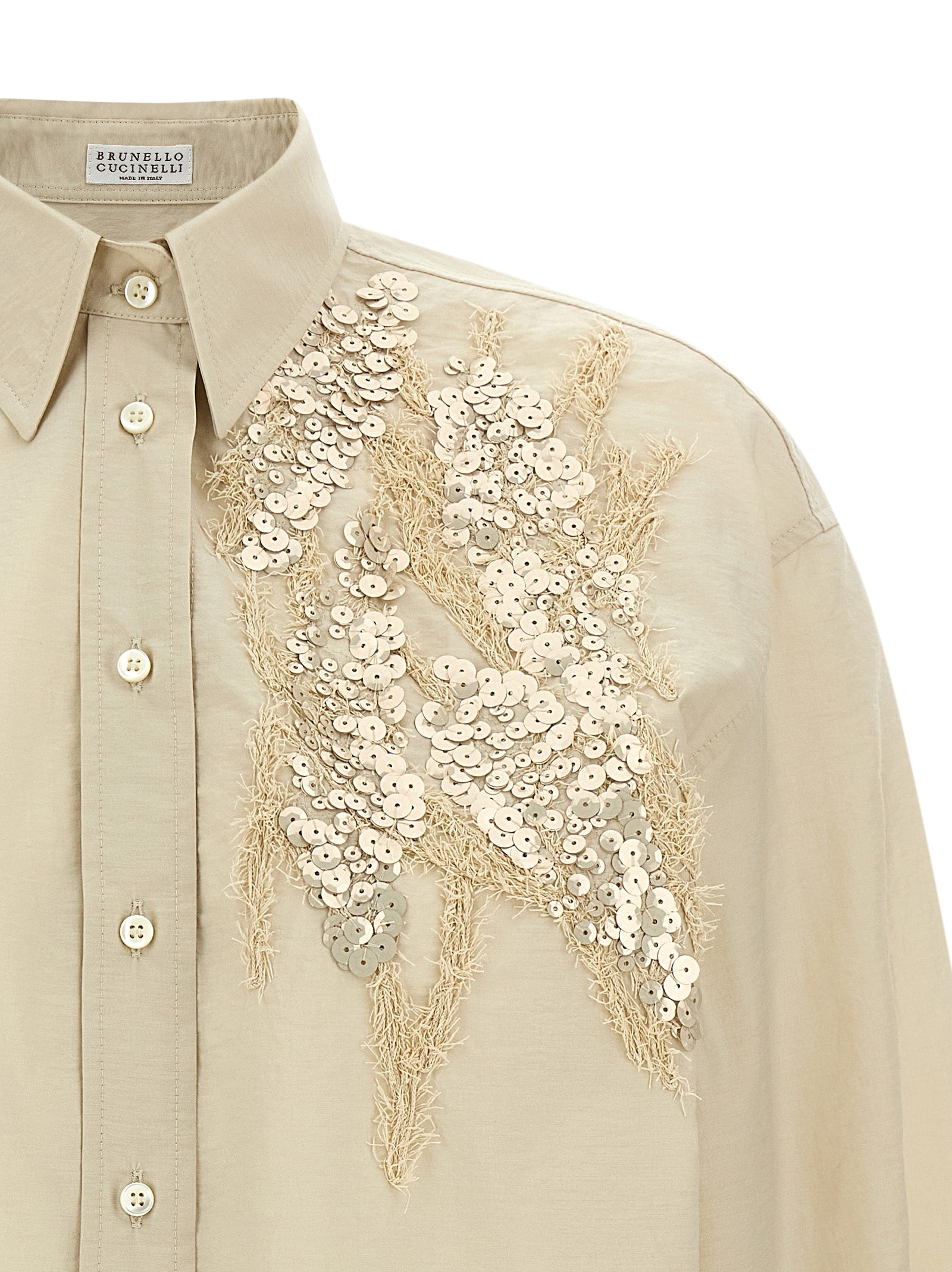 Blouse by Brunello Cucinelli for women in polyamide cotton & sequins beige showcases a sublime silhouette, artfully detailed with a sublime and for a sophisticated, sublime finish.