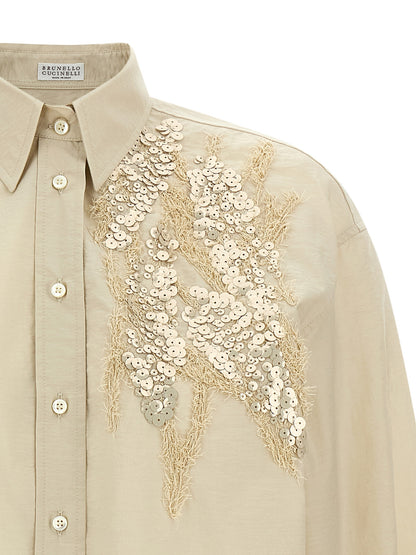 Blouse by Brunello Cucinelli for women in polyamide cotton & sequins beige showcases a sublime silhouette, artfully detailed with a sublime and for a sophisticated, sublime finish.