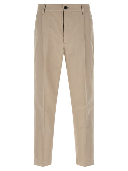 Casual Pants by Department 5 for men in cotton & linen beige presents a tailored silhouette, showcasing a tailored wide and long cut with a refined for a truly tailored aesthetic.