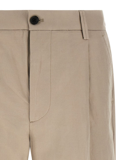 Casual Pants by Department 5 for men in cotton & linen beige features an sartorial wide and long with a cut for a sartorial finish.
