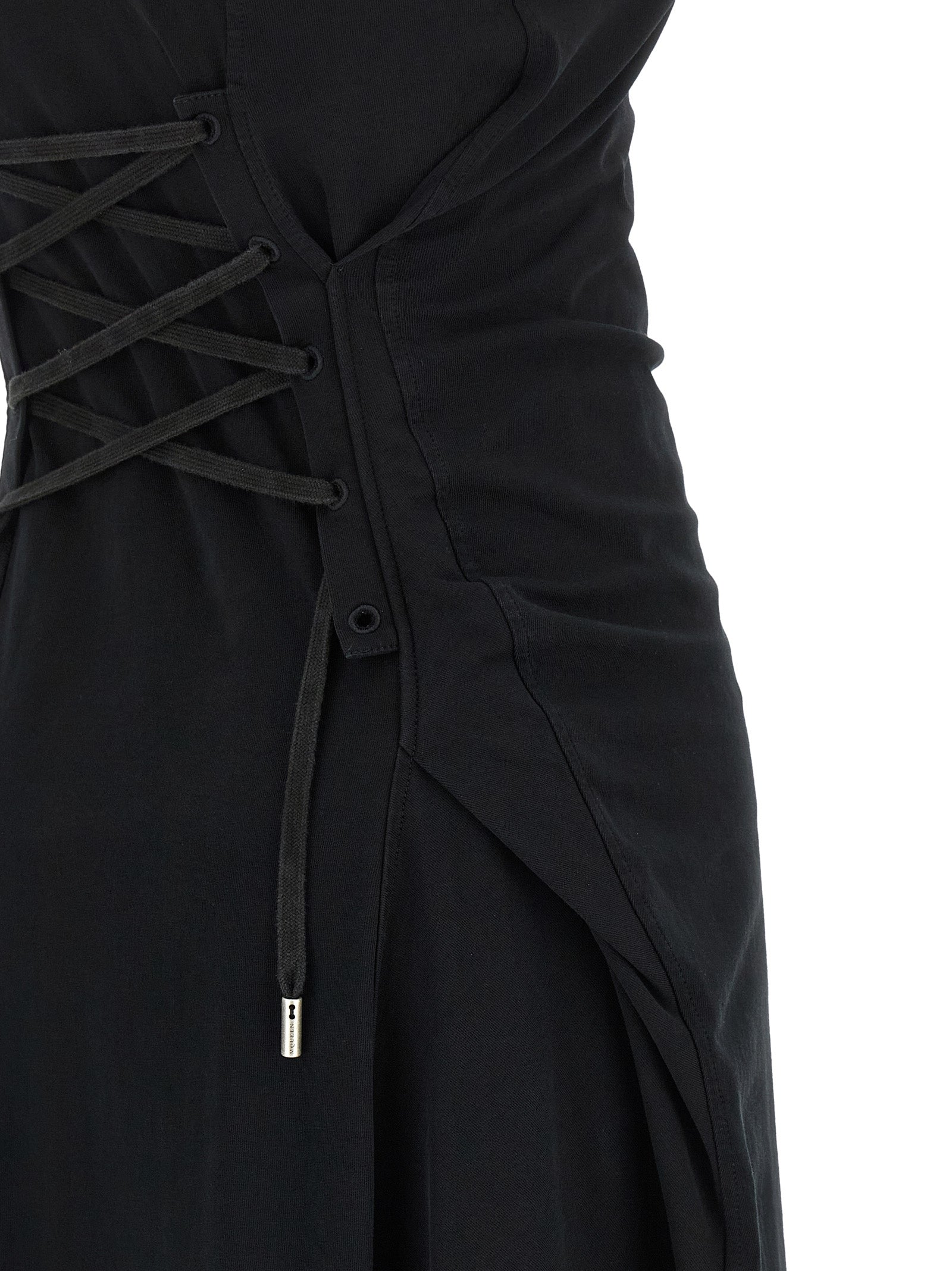 Dress by Alexander McQueen for women in cotton black features an eye catching silhouette with a sophisticated , elegant , and a refined long for a eye catching aesthetic.