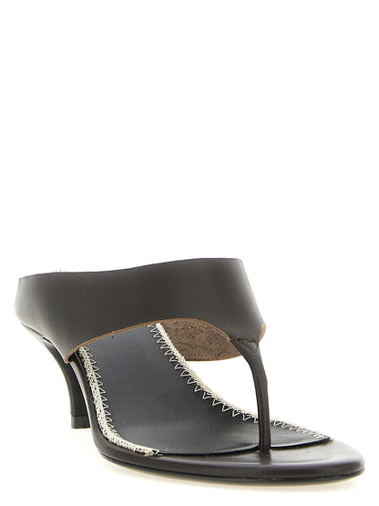 Stiletto Flip-Flop Sandals by Magda Butrym for women in leather brown features an exquisite silhouette, showcasing the exquisite Women's Leather Stiletto Flip-Flop Sandals with a stiletto and .