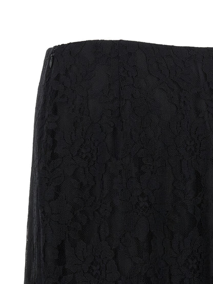 Skirt by Valentino Garavani for women in polyamide cotton chiffon black features an relaxed-yet-refined silhouette that elegantly showcases the Women's Flared Asymmetrical Polyamide Cotton Chiffon Midi Skirt design and sophisticated midi.