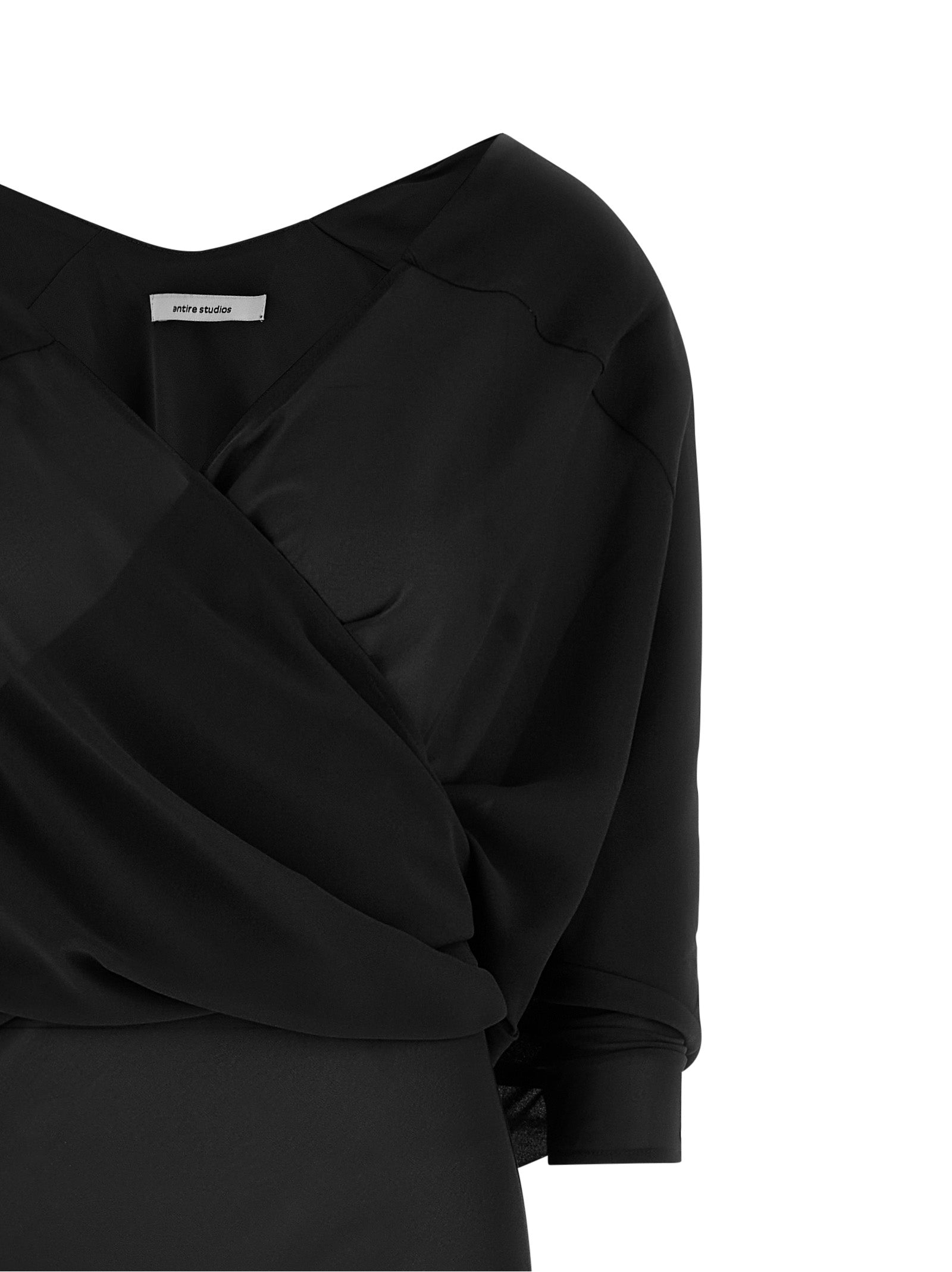 Dress by Entire Studios for women in polyester black & transparent features an magnificent silhouette, artfully detailed with a magnificent v-neck split neckline and that flows into an magnificent long.