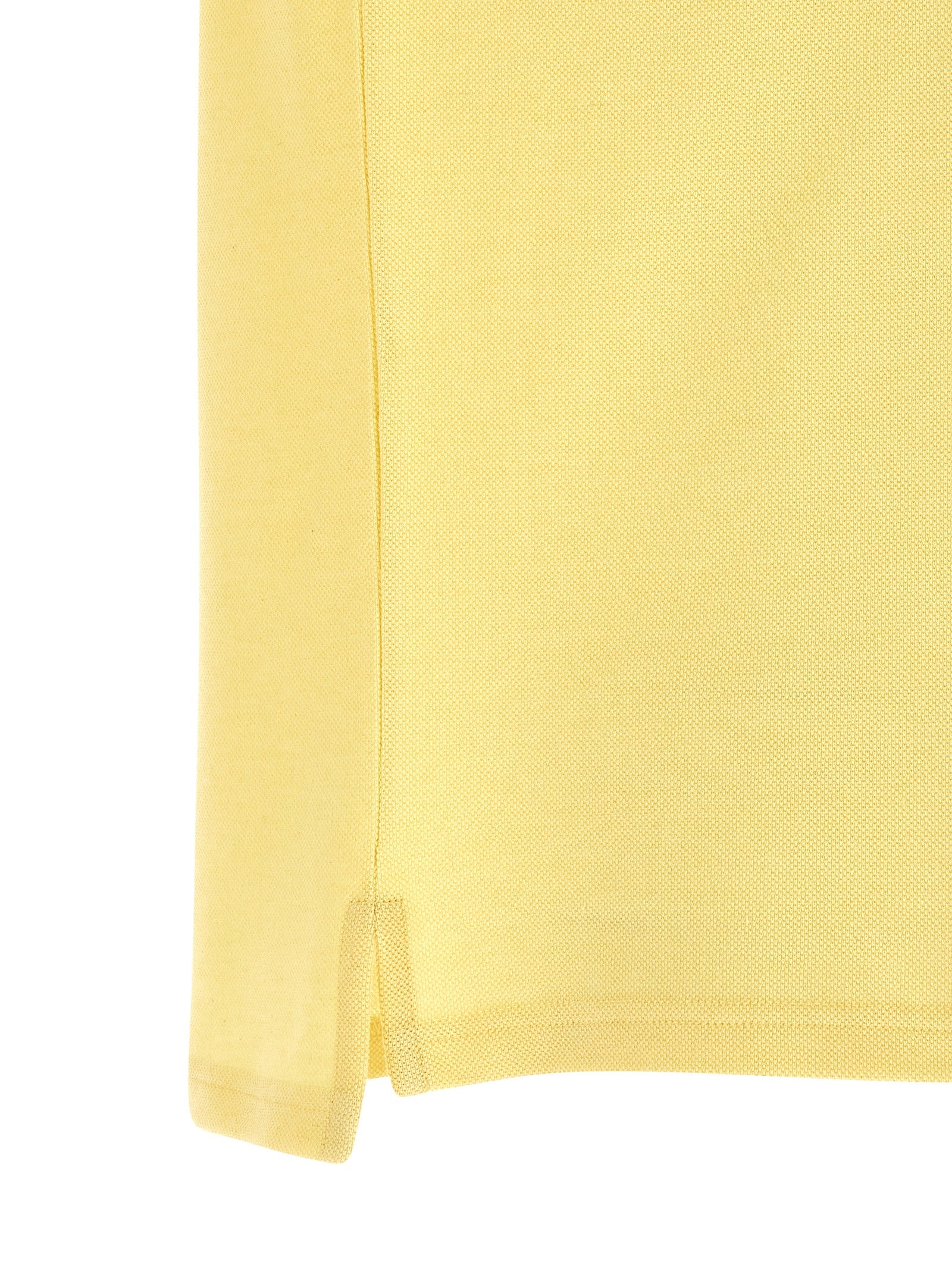 Polo Shirt by Saint Laurent for men in cotton bicolour & yellow showcases a sharp silhouette, detailed with a refined and sharp for a sophisticated finish.