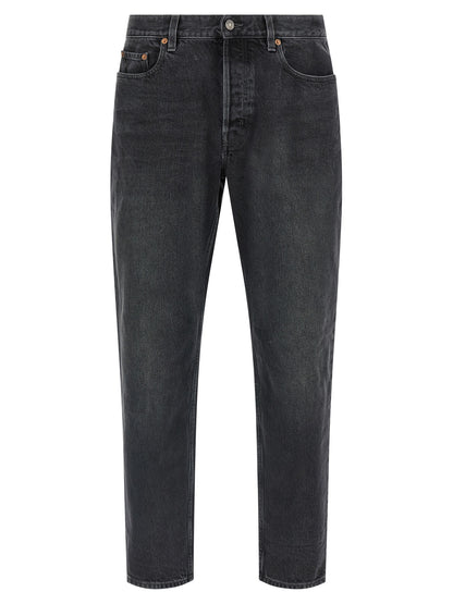 Jeans by Saint Laurent for men in cotton denim black features a polished silhouette with a polished straight-leg, reaching a polished long and finished with a polished .