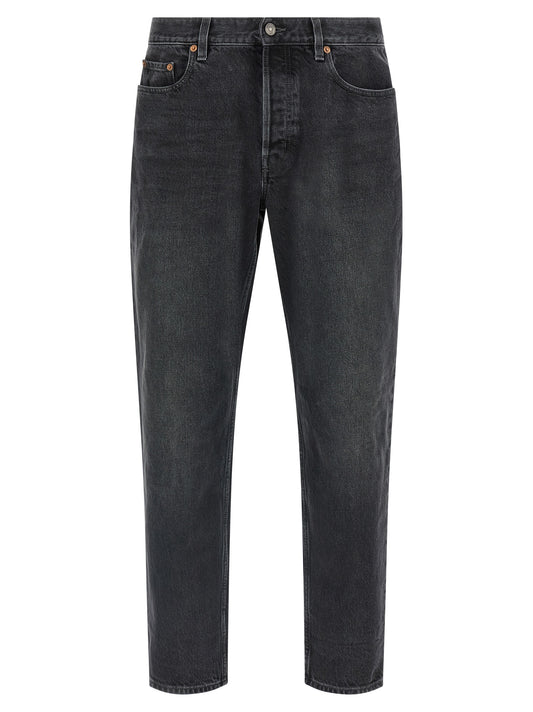 Jeans by Saint Laurent for men in cotton denim black features a polished silhouette with a polished straight-leg, reaching a polished long and finished with a polished .