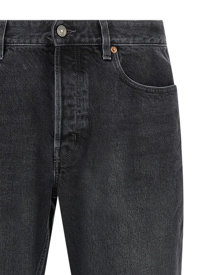 Jeans by Saint Laurent for men in cotton denim black features an sartorial straight-leg and long with a cut for a sartorial finish.
