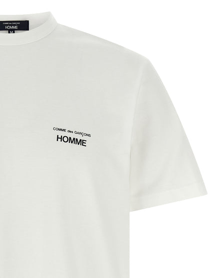 T-Shirt by Comme Des Garçons for men in cotton white & print showcases a dramatic silhouette, elegantly detailed with a dramatic and for a truly dramatic finish.