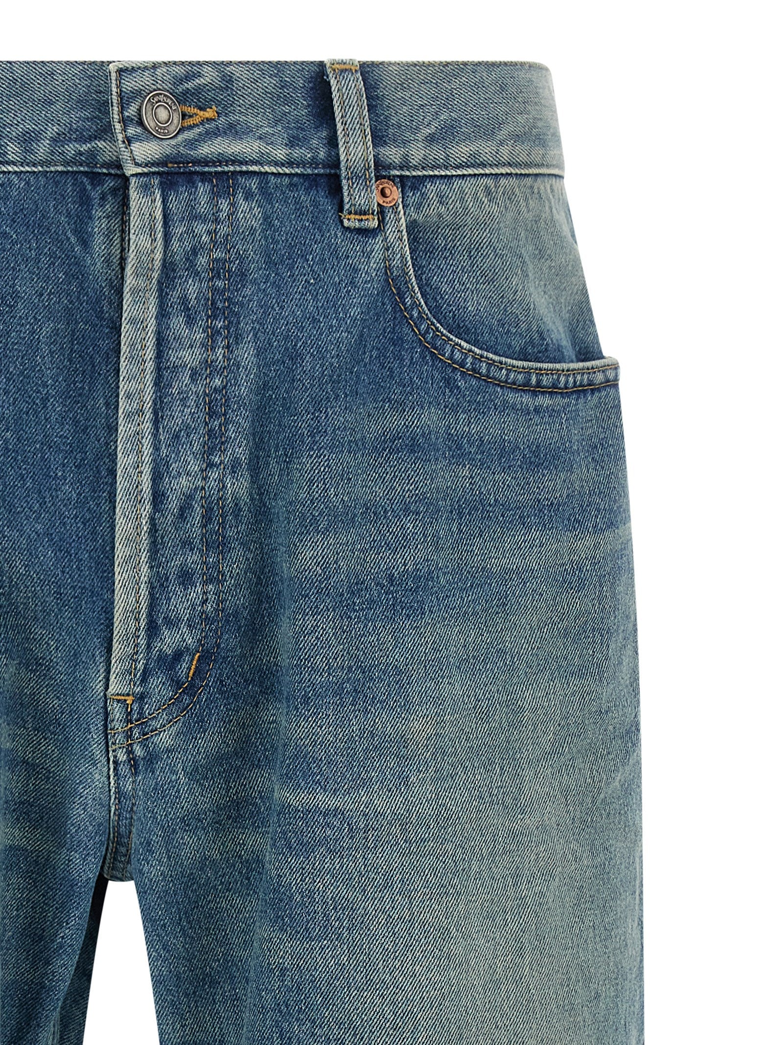 Jeans by Saint Laurent for men in cotton denim blue features a polished silhouette with a polished straight-leg, reaching a polished long and finished with a polished mid rise.