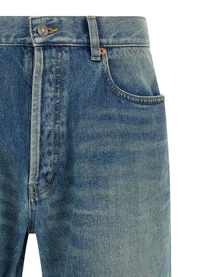 Jeans by Saint Laurent for men in cotton denim blue features a polished silhouette with a polished straight-leg, reaching a polished long and finished with a polished mid rise.