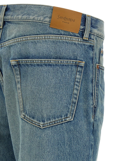 Jeans by Saint Laurent for men in cotton denim blue presents a refined pantology silhouette, artfully defined by a refined pantology straight-leg, long, and a sophisticated mid rise.