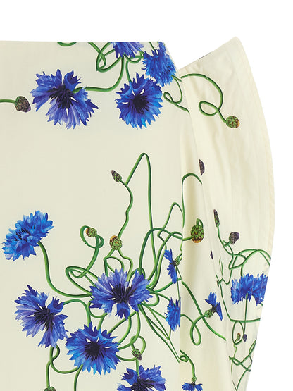 Skirt by Stella McCartney for women in cotton blue, floral & print showcases a sultry silhouette, elegantly defined by its mini and the sophisticated sultry design of the Women's High Rise Cotton Mini Skirt.