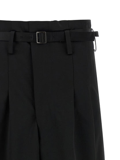Trousers by Junya Watanabe for women in satin acetate wool black features an on trend silhouette, showcasing a sophisticated flared, wide & cropped with a cropped and high rise for an on trend finish.