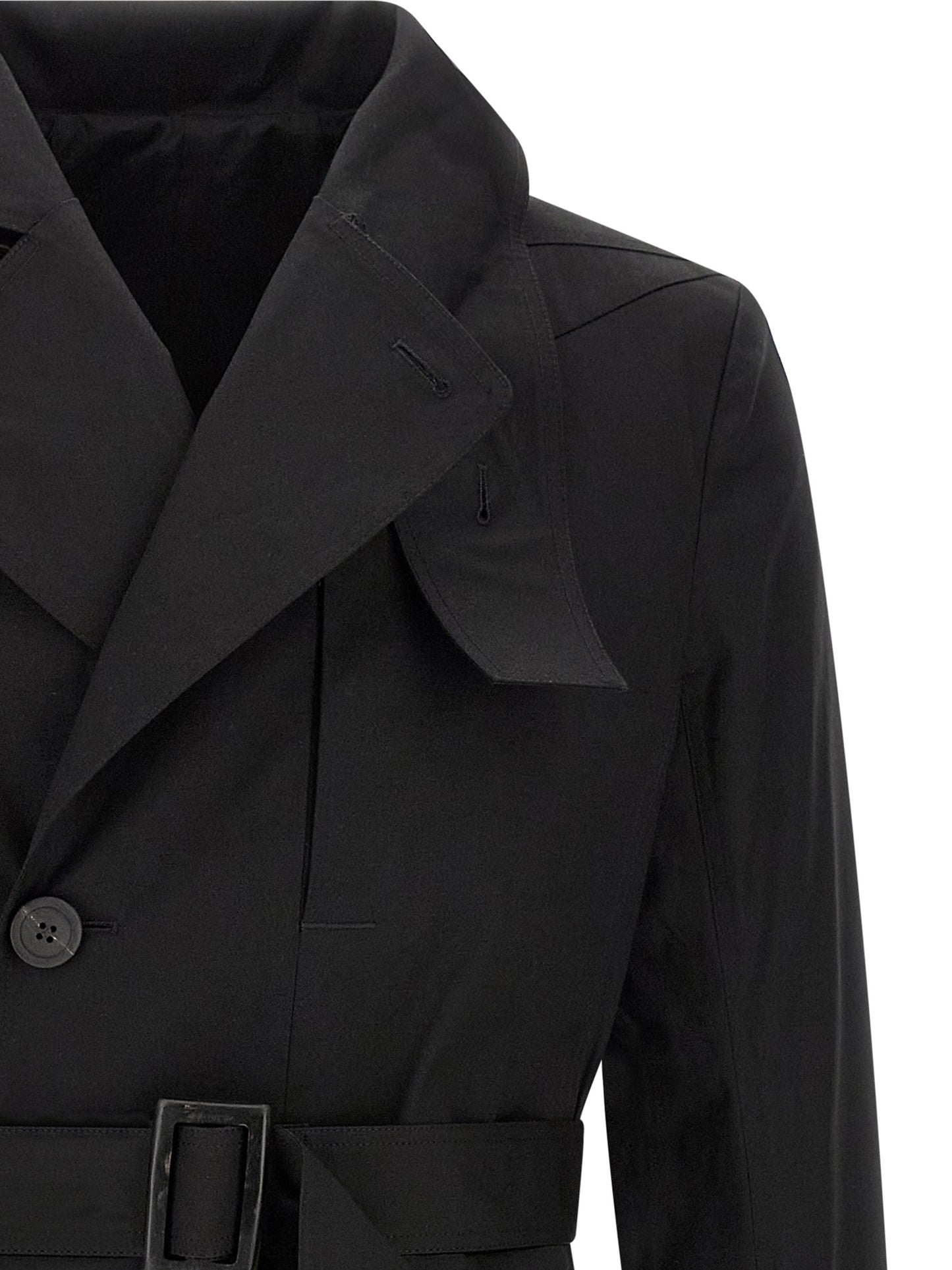Trench Coat by Rick Owens for men in stretch cotton black presents an sculptural silhouette, artfully detailed with a sculptural and functional insulated for a truly sculptural finish.