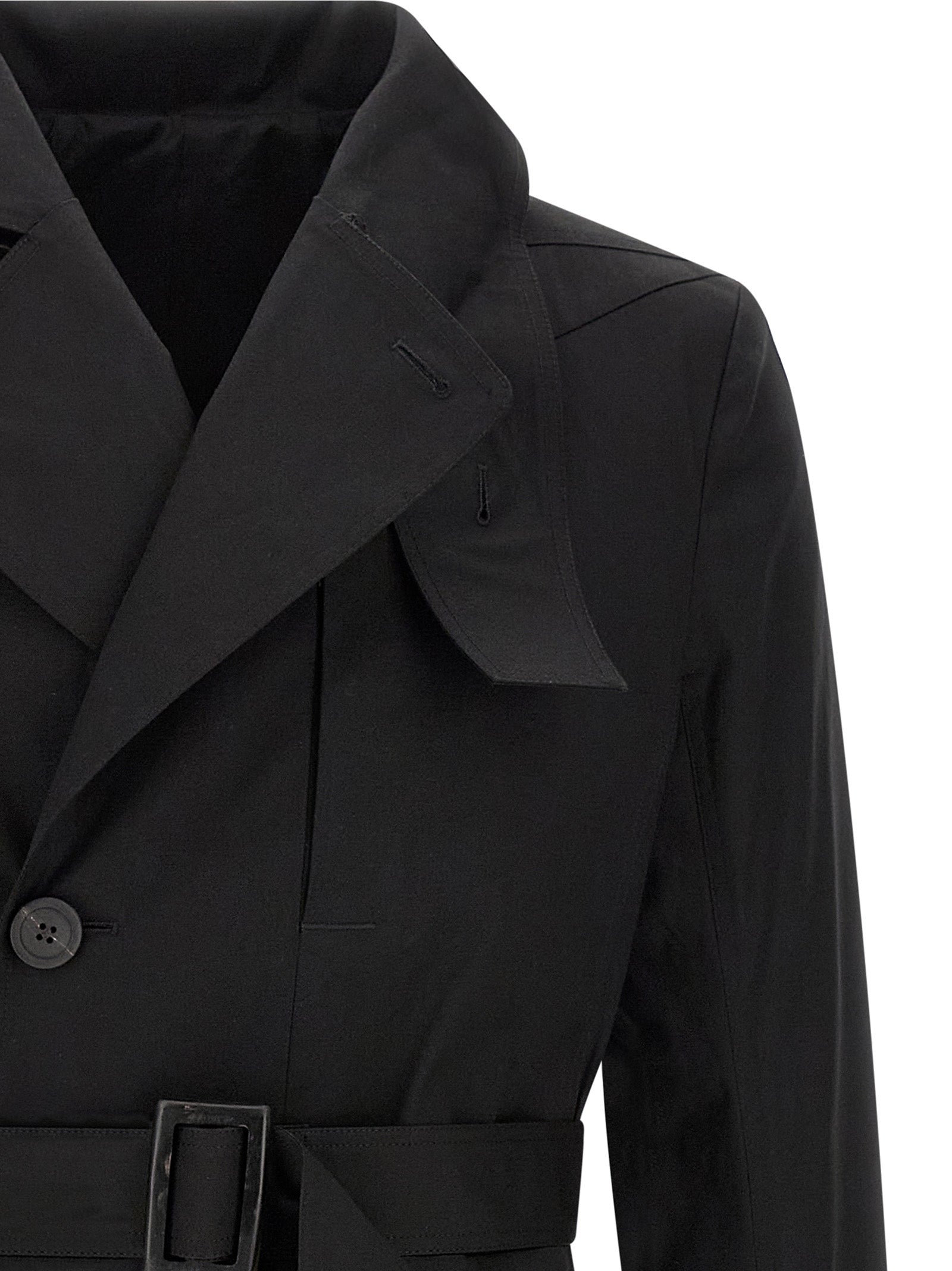 Trench Coat by Rick Owens for men in stretch cotton black presents an sculptural silhouette, artfully detailed with a sculptural and functional insulated for a truly sculptural finish.