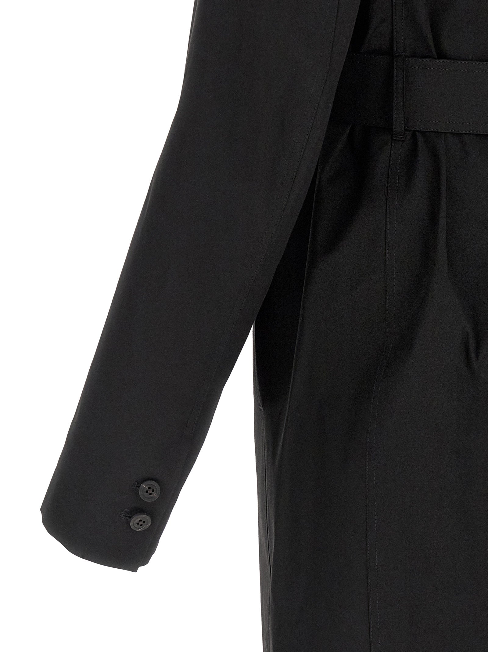 Trench Coat by Rick Owens for men in stretch cotton black presents a distinguished silhouette, artfully detailed with insulated and a distinguished for a sophisticated, distinguished finish.