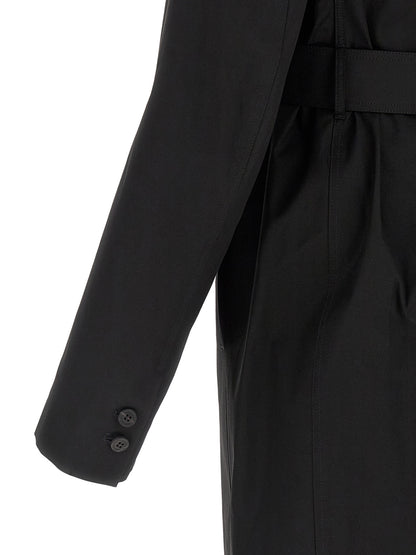 Trench Coat by Rick Owens for men in stretch cotton black presents a distinguished silhouette, artfully detailed with insulated and a distinguished for a sophisticated, distinguished finish.