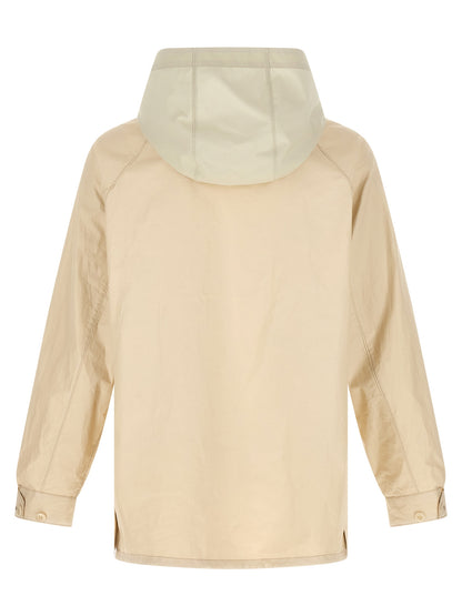 Hooded Windbreaker Jacket by Lemaire for men in polyurethane linen & cotton beige features an perennial silhouette with a refined hooded shirt-collar neckline and perennial water-resistant, pockets, hooded & windproof for a sophisticated weather-resistant look.