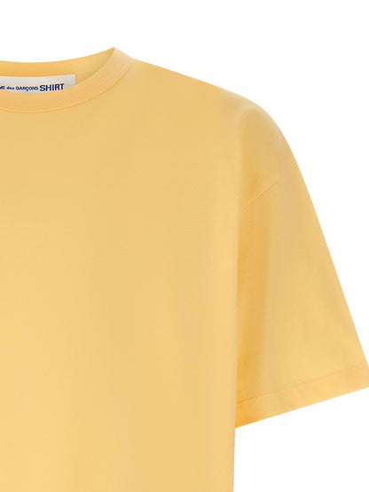 T-Shirt by Comme Des Garçons for men in cotton orange & print features an edgy silhouette, meticulously detailed with a sophisticated and crew neckline for a truly edgy finish.