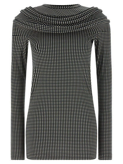 Dress by Junya Watanabe for women in cotton bicolour, black, white & patterned showcases a striking silhouette, elegantly detailed with a long-sleeve, refined crew neckline, and a striking short mini for a striking finish.