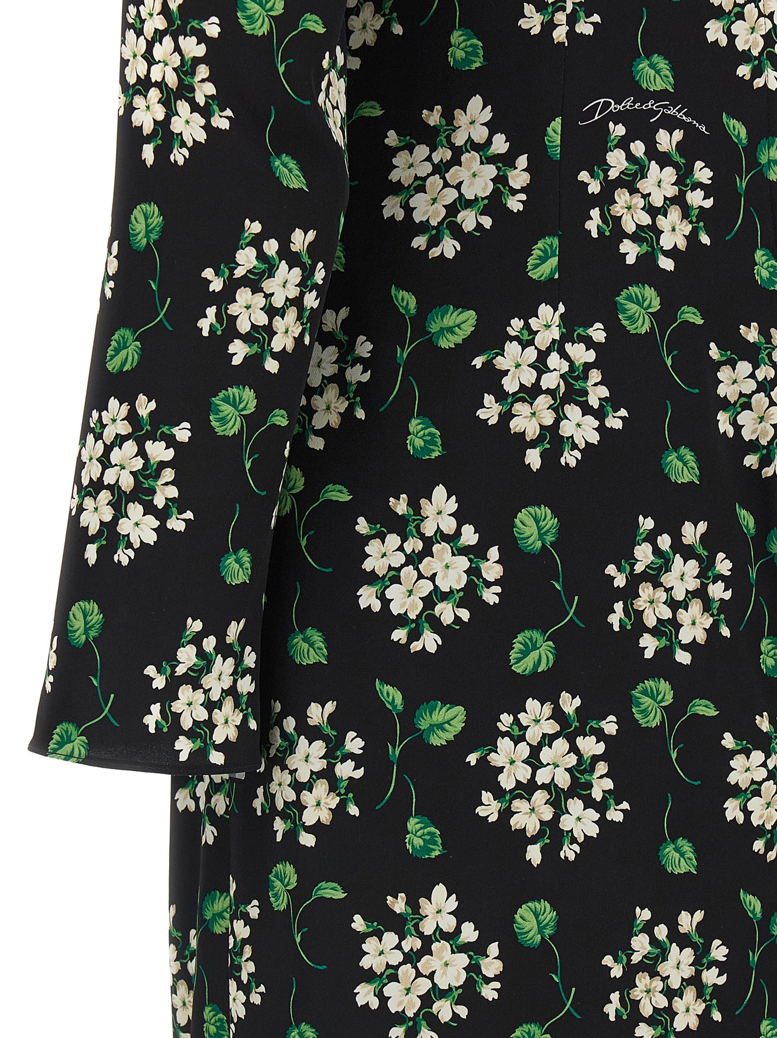 Dress by Dolce & Gabbana for women in synthetic silk black & print features an sultry silhouette defined by a and , falling to an sultry midi for a sultry look.