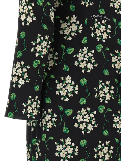 Dress by Dolce & Gabbana for women in synthetic silk black & print features an sultry silhouette defined by a and , falling to an sultry midi for a sultry look.