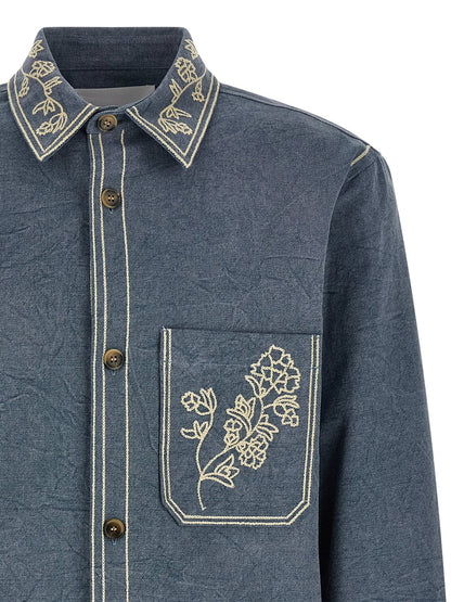 Overshirt by Isabel Marant for men in cotton blue & floral presents a discerning silhouette, showcasing a sophisticated and for a truly discerning finish.