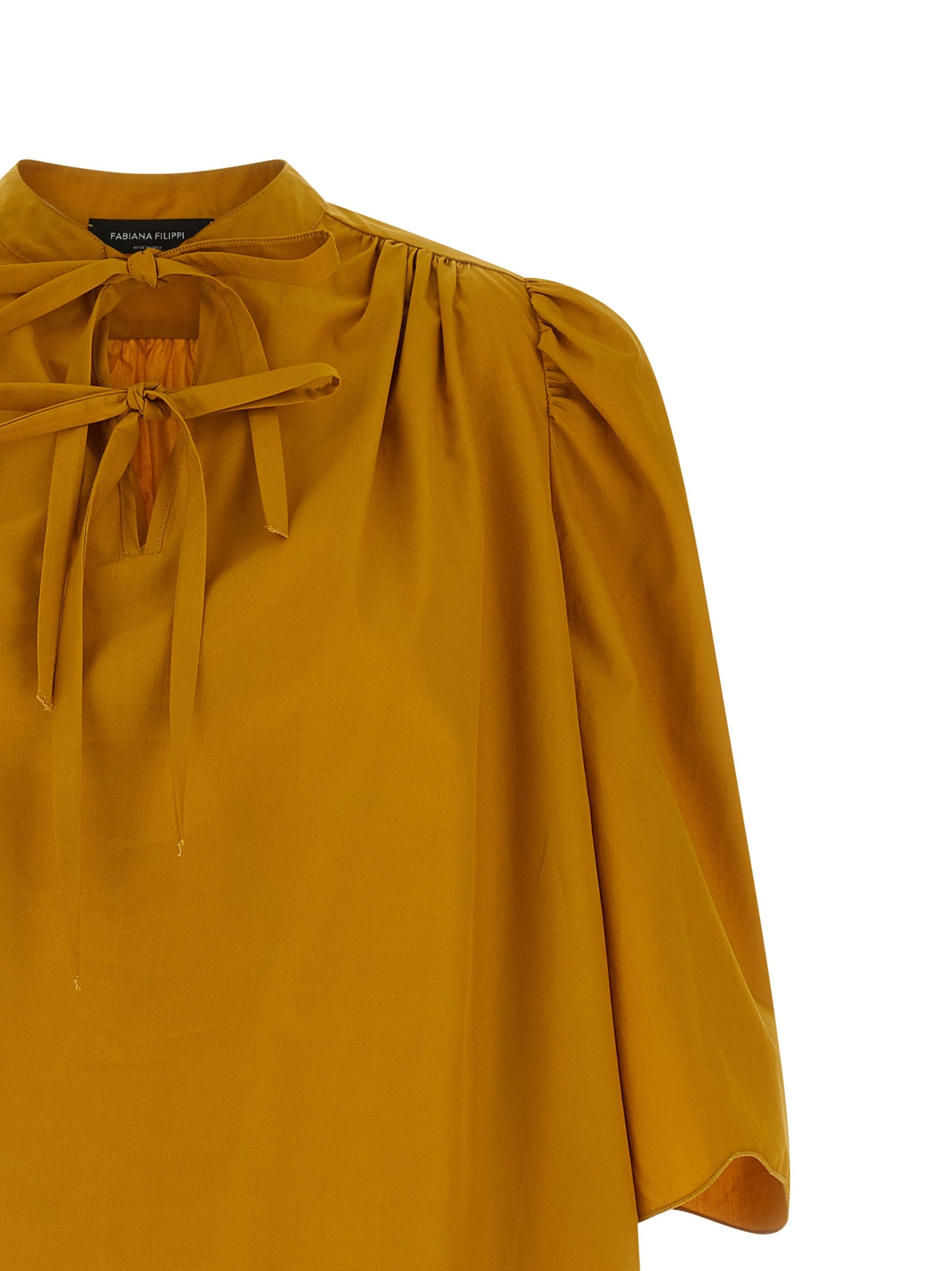 Dress by Fabiana Filippi for women in cotton bicolour & yellow showcases a striking silhouette, elegantly detailed with a , refined v-neck neckline, and a striking short for a striking finish.