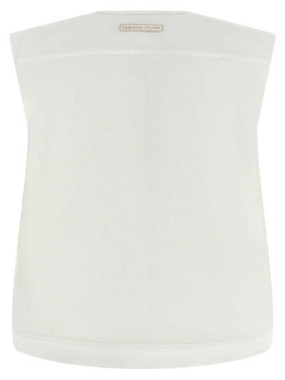 Vest by Fabiana Filippi for women in stretch denim cotton gold & white features a enviable silhouette, elegantly detailed with a enviable crew neckline and functional pockets for a enviable finish.