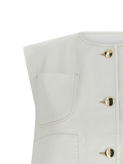 Vest by Fabiana Filippi for women in stretch denim cotton gold & white showcases a dynamic silhouette, perfectly balancing pockets with a dynamic crew neckline for a sophisticated, high-fashion look.
