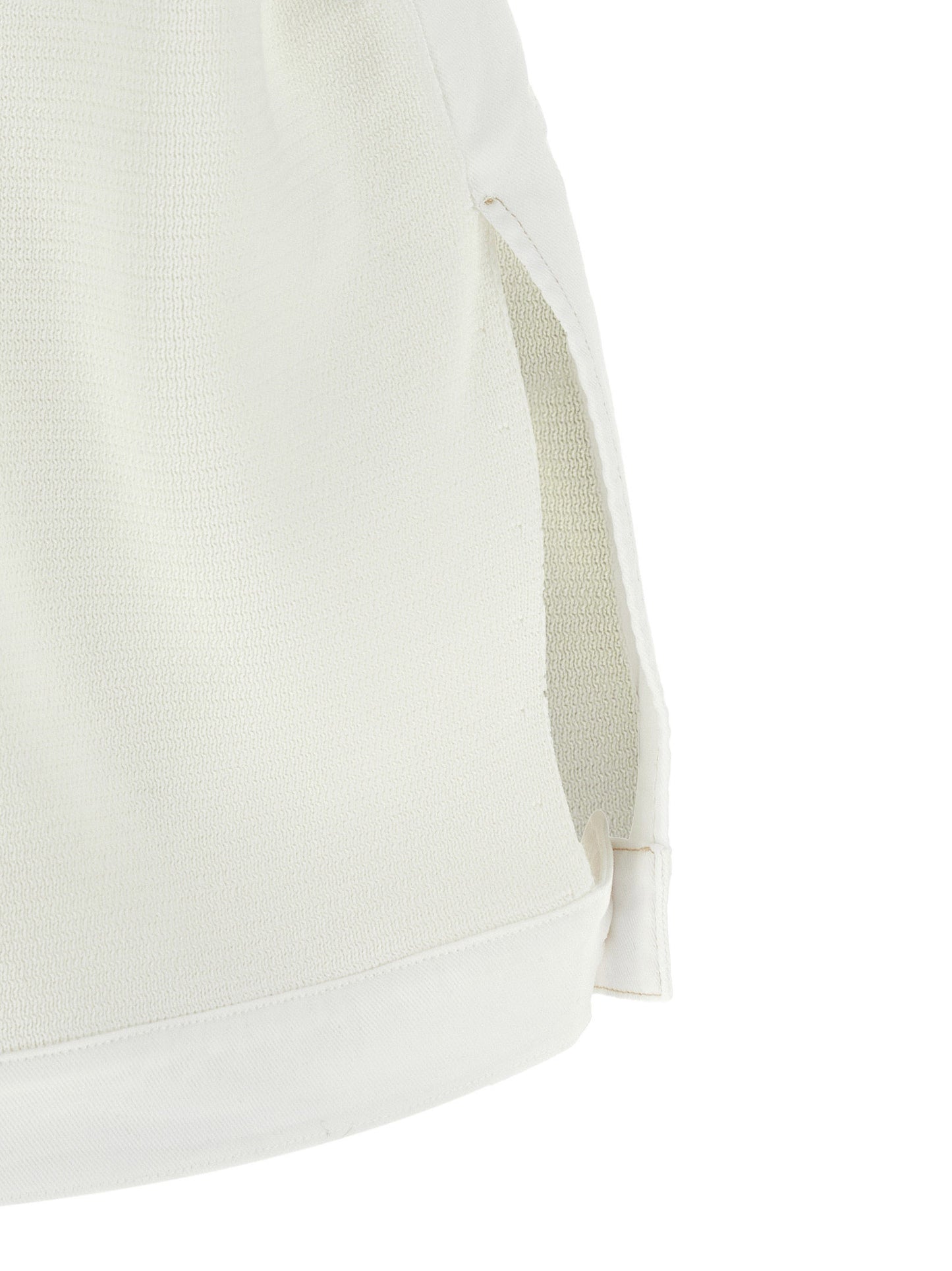 Vest by Fabiana Filippi for women in stretch denim cotton gold & white showcases a utilitarian silhouette, artfully incorporating pockets and a utilitarian crew neckline for a truly utilitarian finish.
