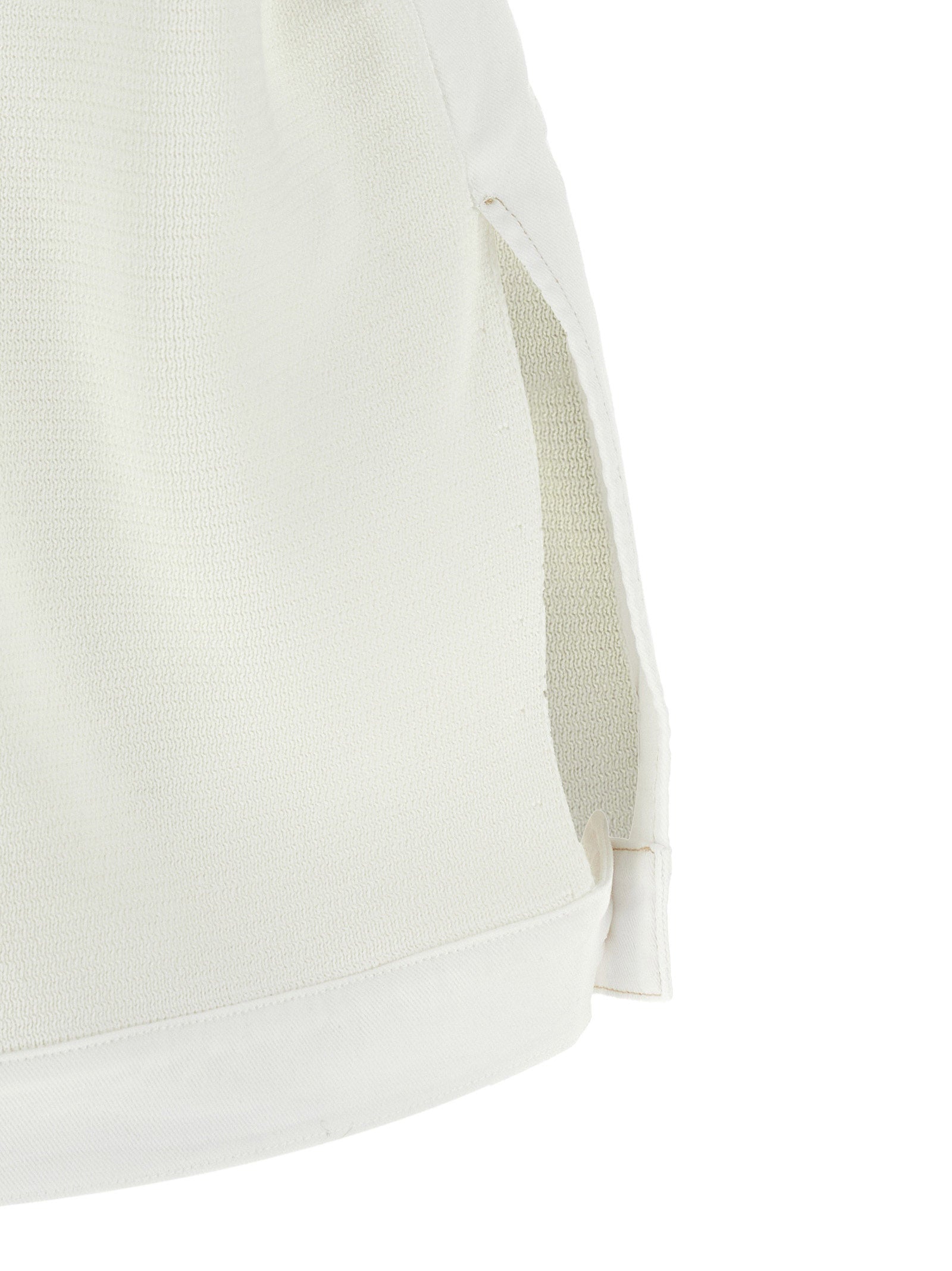 Vest by Fabiana Filippi for women in stretch denim cotton gold & white showcases a utilitarian silhouette, artfully incorporating pockets and a utilitarian crew neckline for a truly utilitarian finish.