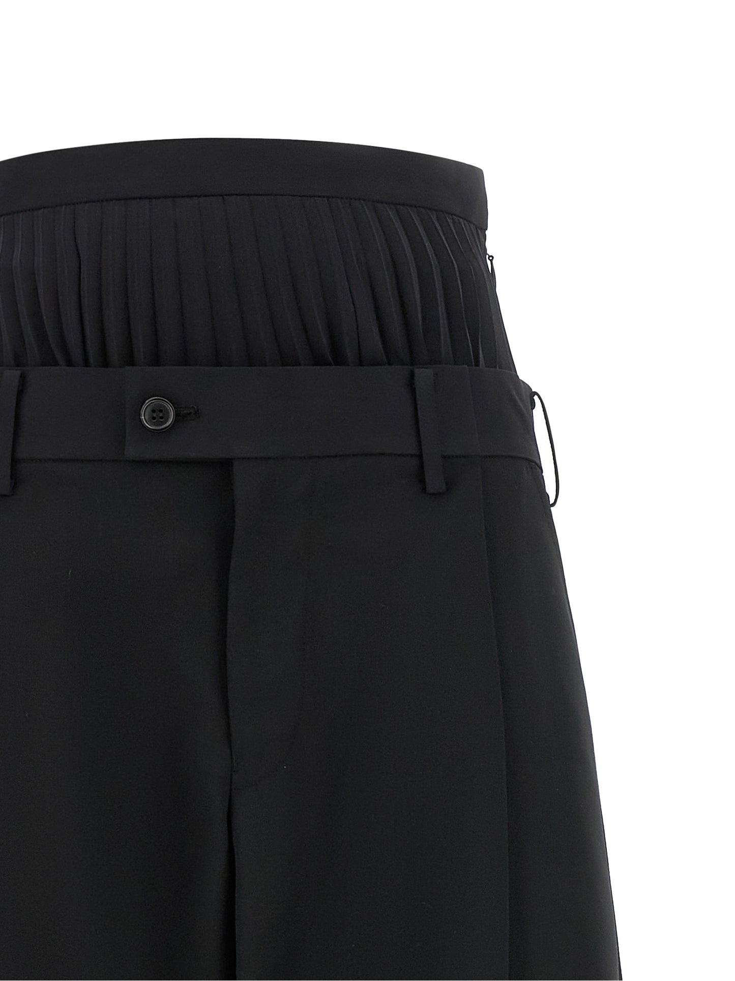 Trousers by Junya Watanabe for women in polyester polyurethane wool black presents a perennial silhouette, meticulously tailored with a straight cut, long finish, and an elegant .