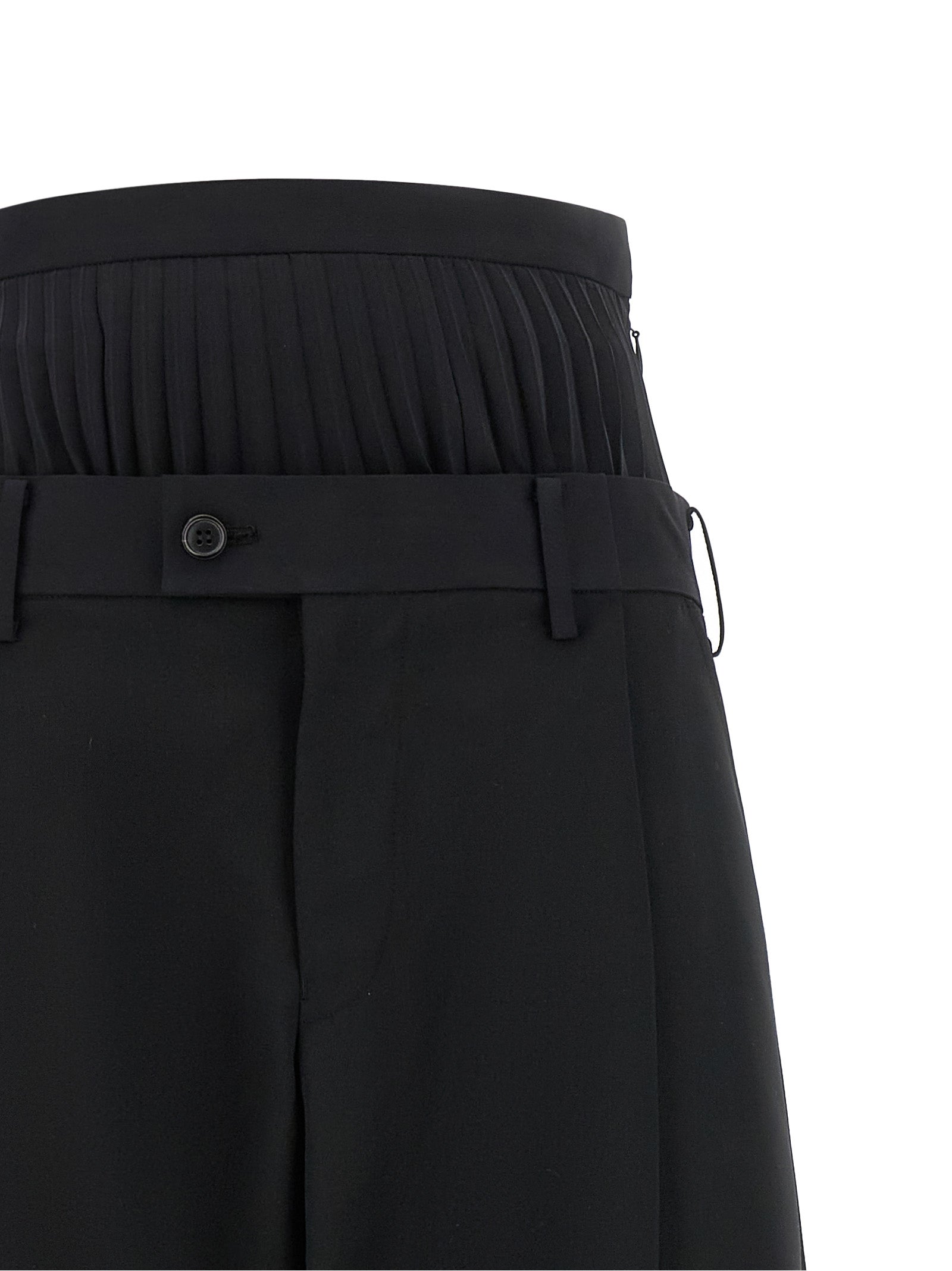 Trousers by Junya Watanabe for women in polyester polyurethane wool black presents a perennial silhouette, meticulously tailored with a straight cut, long finish, and an elegant .