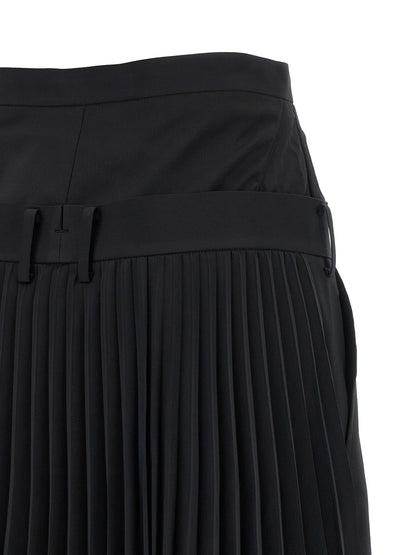 Trousers by Junya Watanabe for women in polyester polyurethane wool black features an sartorial silhouette, showcasing a precise straight and long with a sartorial for a refined look.