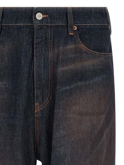 Jeans by MM6 Maison Margiela for men in cotton denim blue features a refined silhouette with a refined straight-leg, defined by a high rise and a refined long for a refined finish.