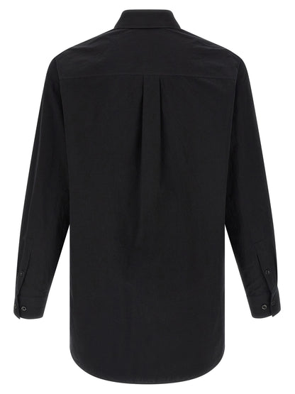 Shirt by Lemaire for men in cotton black presents a discerning silhouette, showcasing a sophisticated and for a truly discerning finish.