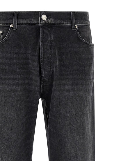 Jeans by Department 5 for men in stretch denim cotton black features an sophisticated and straight-leg, wide & cropped with a precise cropped, creating a sophisticated and sophisticated silhouette.