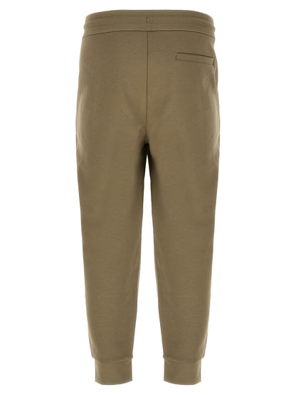 Joggers by Hugo Boss for men in polyester cotton & leather bicolour & green features a refined silhouette with a refined straight-leg, defined by a and a refined long for a refined finish.